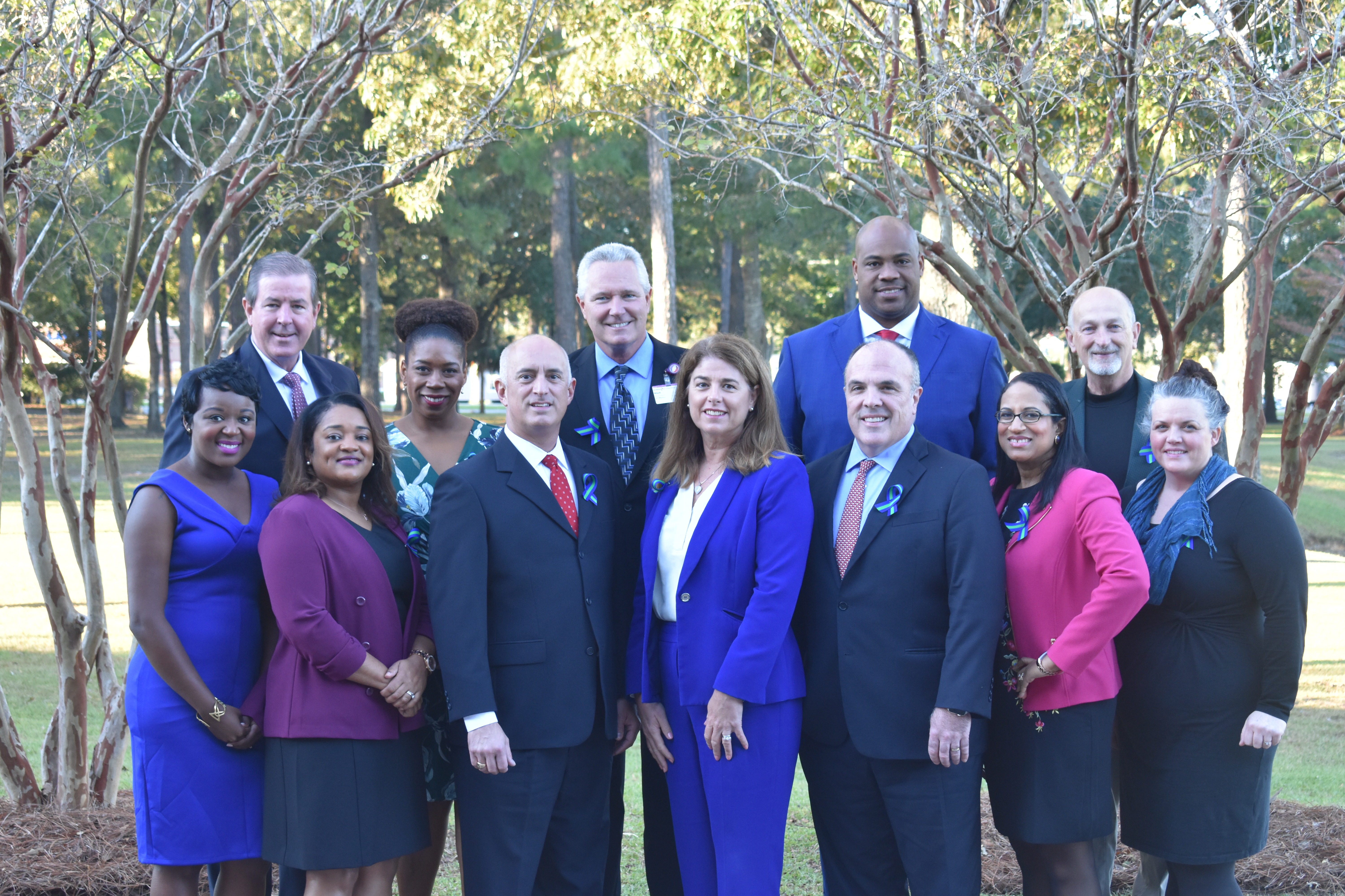 From left to right: Kim Butler Willis, Chris Kerrigan, Renee Linyard-Gary, Kellye McKenzie, R. Taylor Lee, Mark Dickson, Lorraine Lutton, Dr. Patrick Cawley, Anton Gunn, Amanda Lawrence, Paul Weiters, Tara Tsehlana