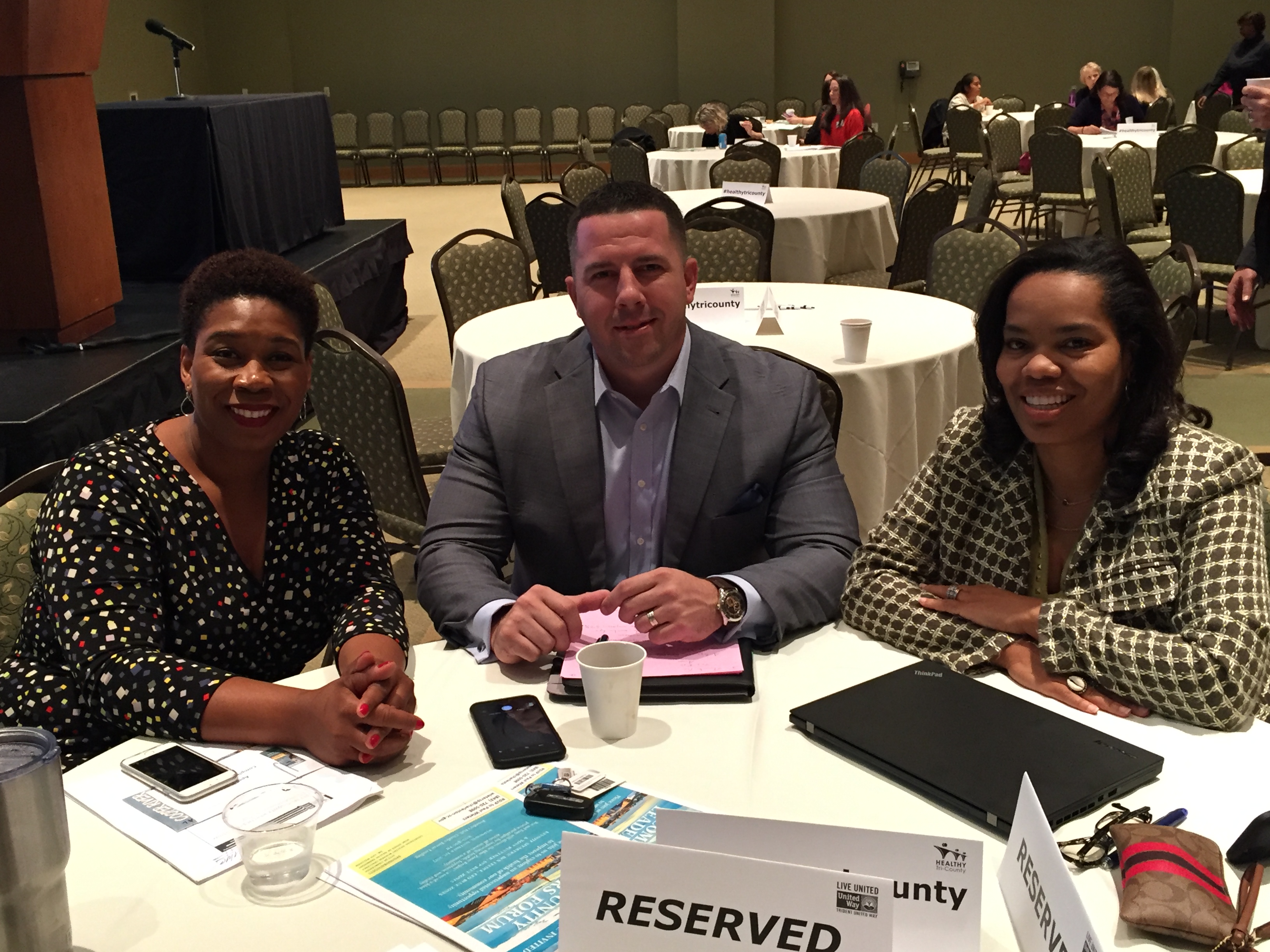 L to R: Kellye McKenzie, Director of Health at Trident United Way; Forrest Alton, President at 1,000 Feathers; Bethany Johnson-Javois, CEO of St. Louis Integrated Health Network