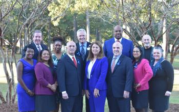 From left to right: Kim Butler Willis, Chris Kerrigan, Renee Linyard-Gary, Kellye McKenzie, R. Taylor Lee, Mark Dickson, Lorraine Lutton, Dr. Patrick Cawley, Anton Gunn, Amanda Lawrence, Paul Weiters, Tara Tsehlana